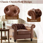 Poltrona Chesterfield Club con braccioli arrotolati, borchie e gambe in legno massello